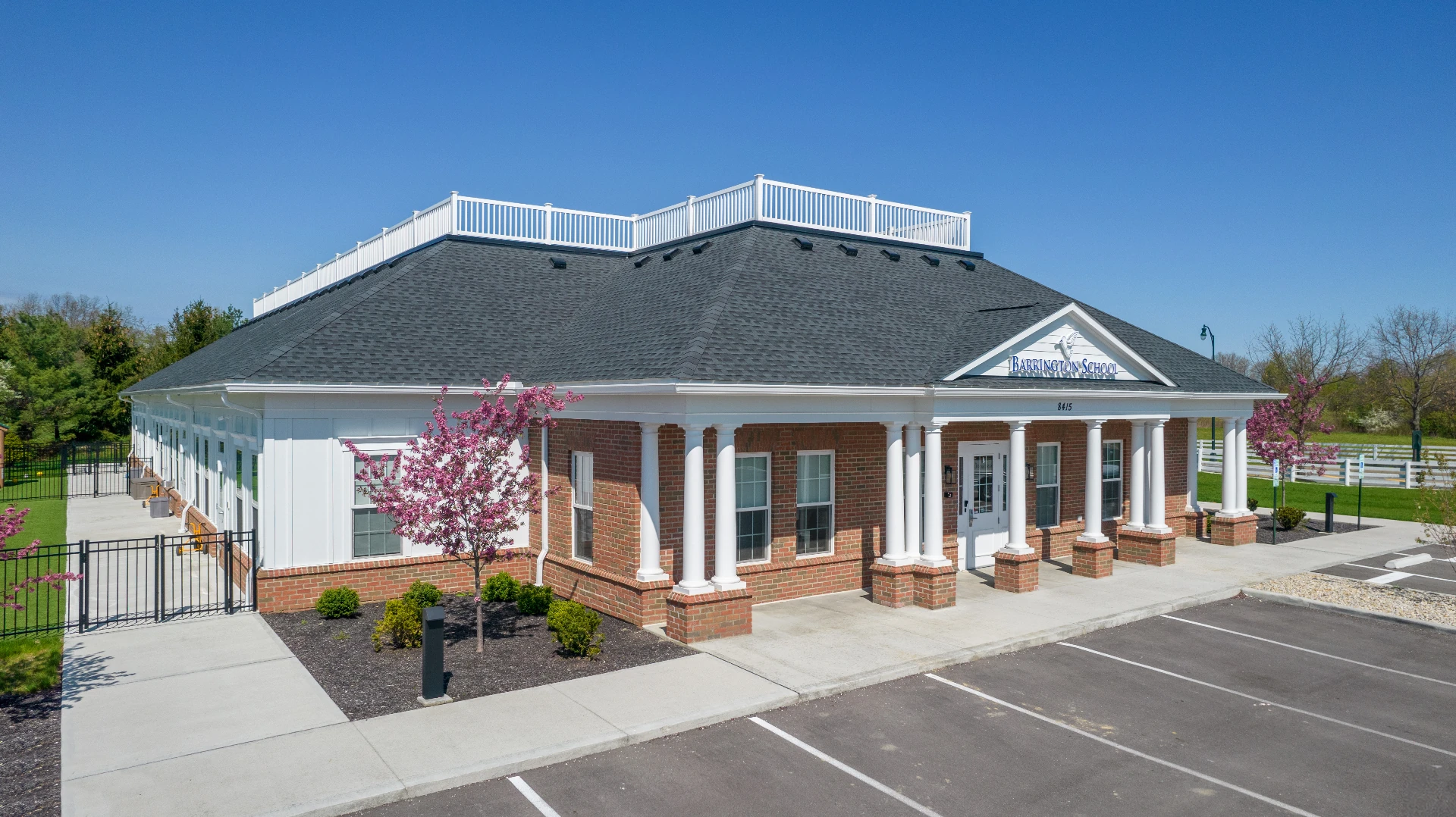 The Barrington School building exterior on a clear day